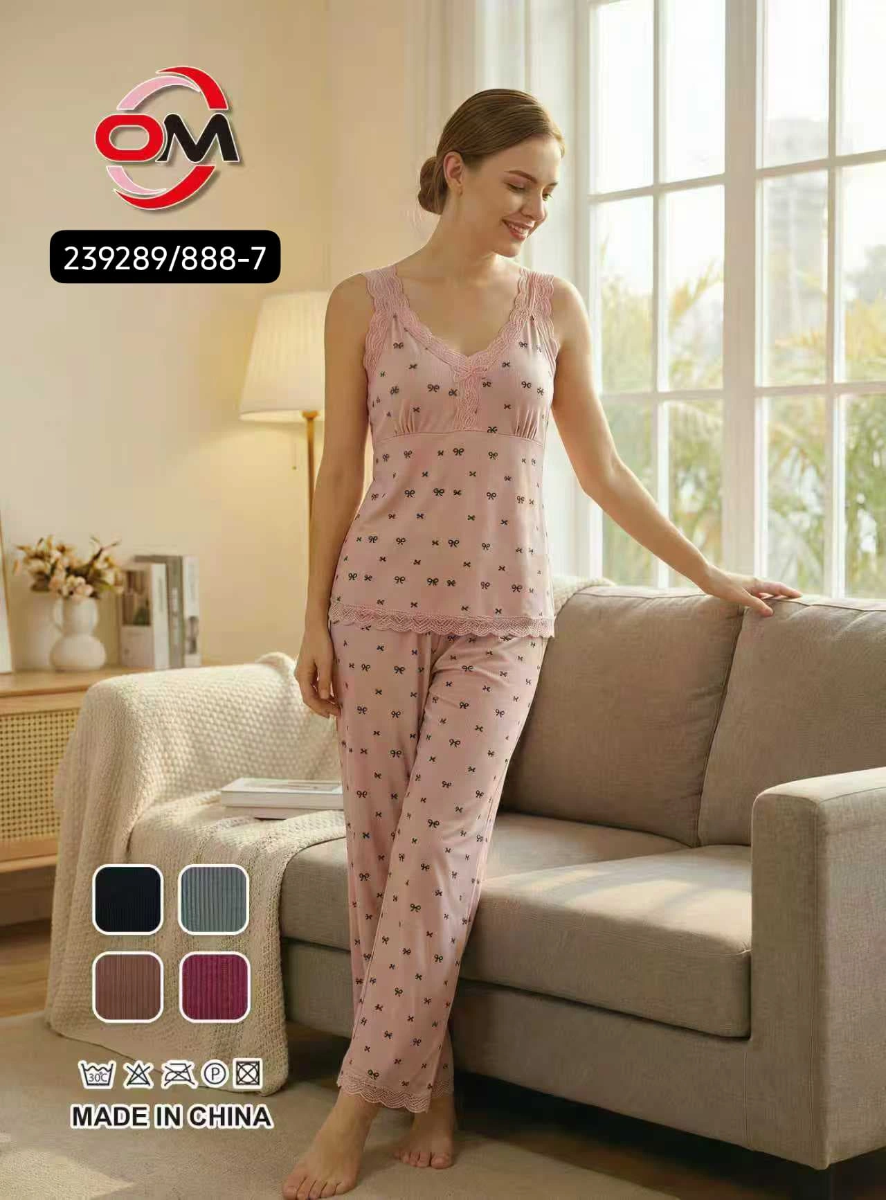 Women’s pink printed pajama set with lace trim camisole and matching trousers